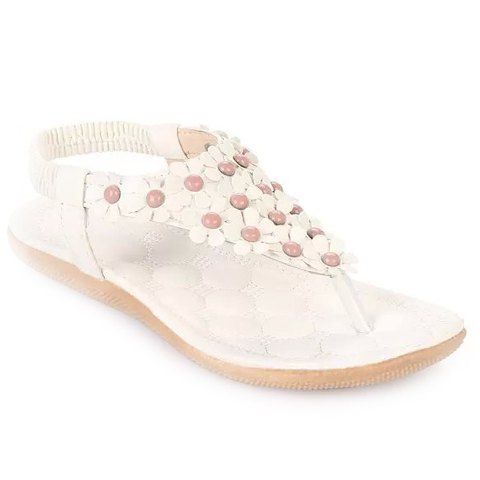 white elastic sandals