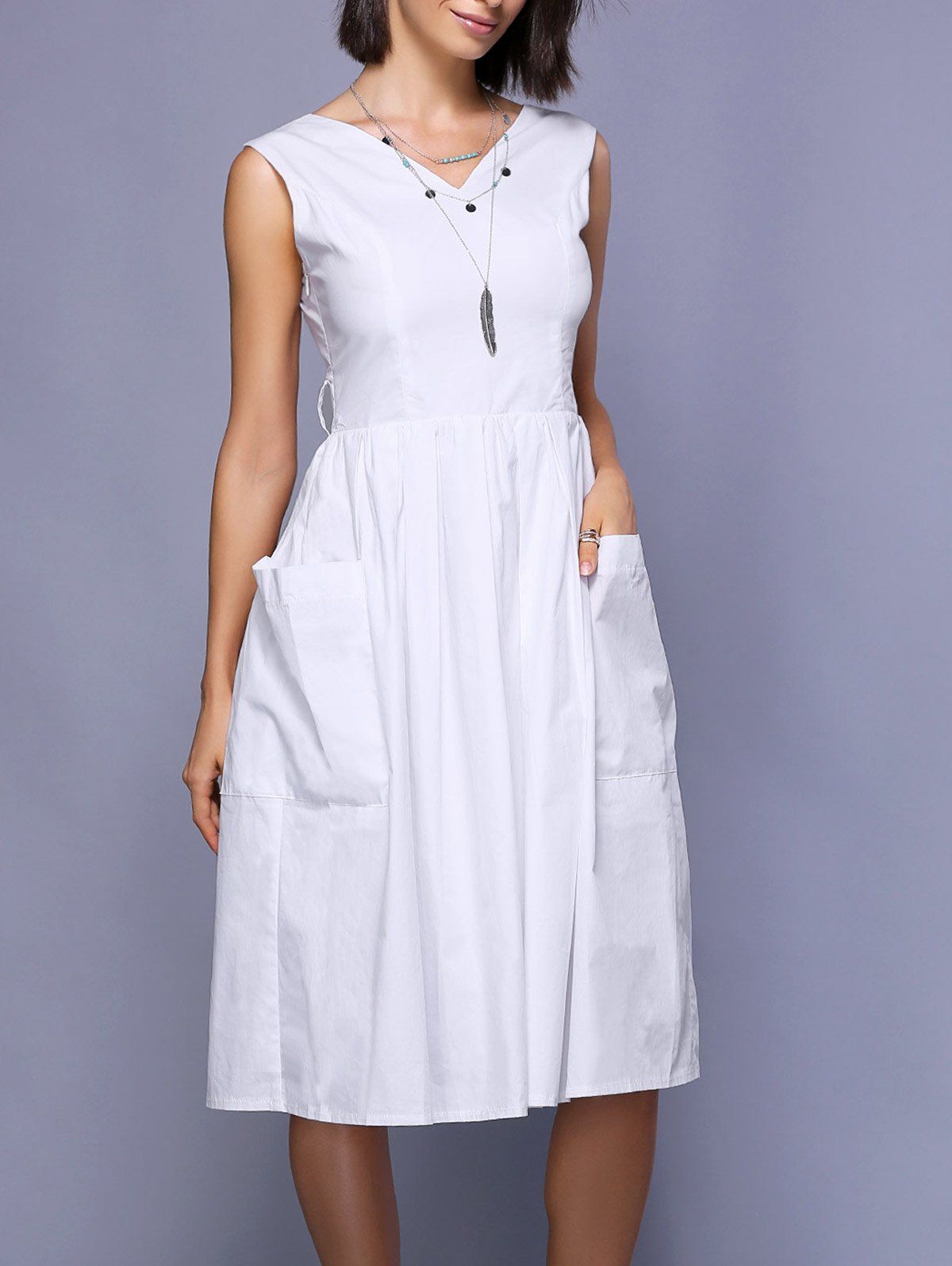 sleeveless white gown