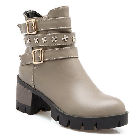 gray boots with buckles