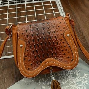 Tassel Detail Embossed Crossbody Bag