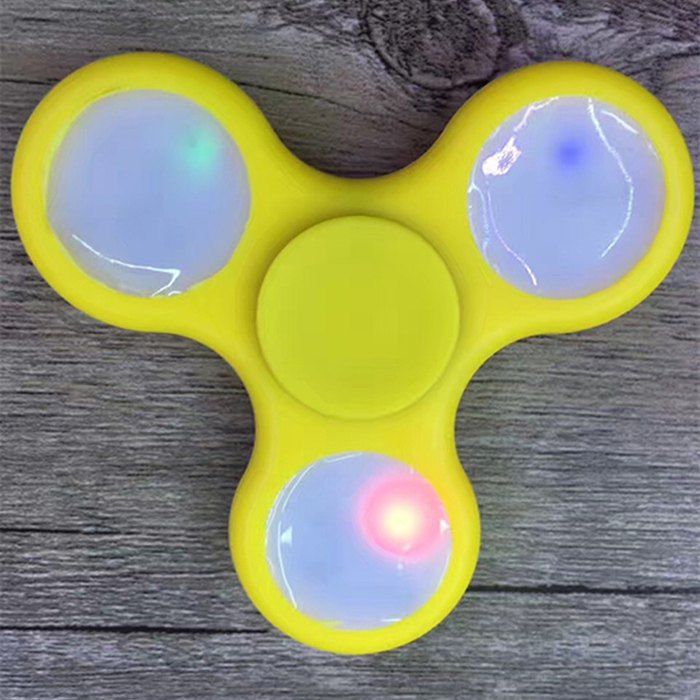 

Rotating Fidget Finger Spinner with Color Changing LED Lights, Yellow