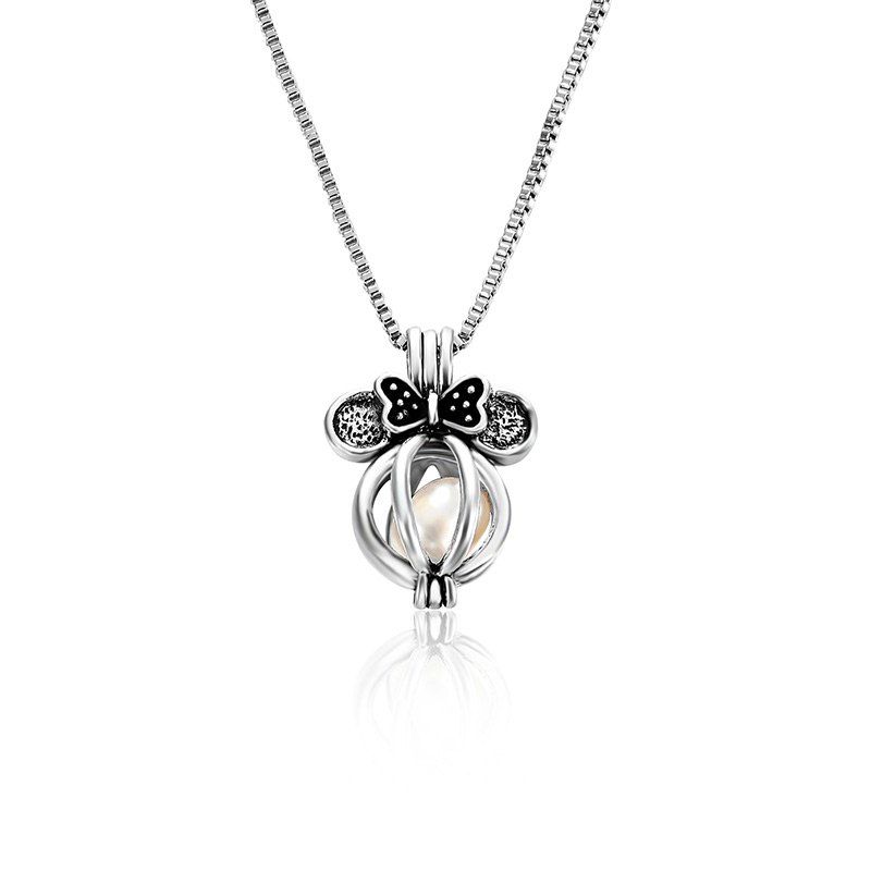 

Faux Pearl Bows Cage Locket Necklace, Silver