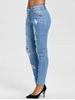 Light Wash Distressed Jeans -  