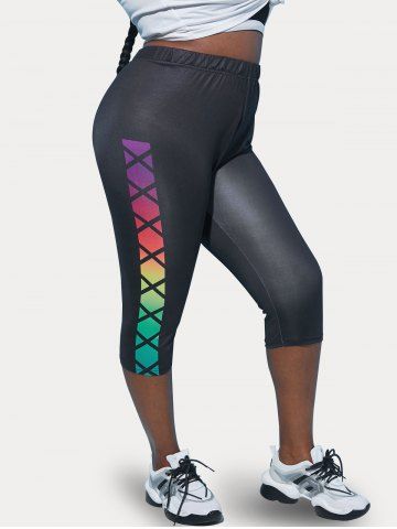 Plus Size Rainbow Criss-cross Print Capri Leggings - BLACK - 5X