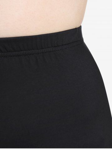 Plus Size Colorblock Musical Notes Print Capri Leggings