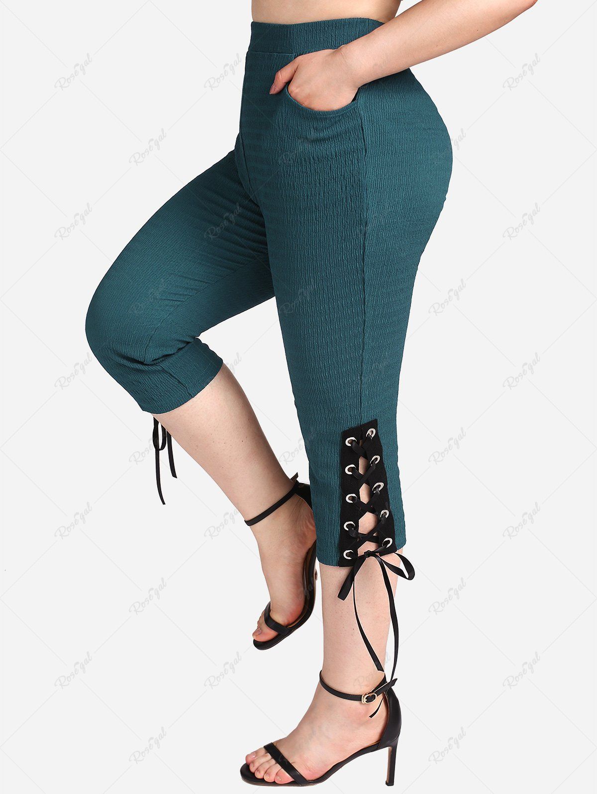 Trendy Plus Size Pockets Lace Up Textured Capri Pants  