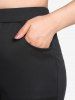Plus Size Pockets Hollow Out Capri Leggings -  