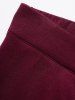 Mock Button Layered Tassel High Low Mini Skirt -  