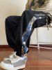 Men's TOWERING Bear Embroidered Beam Feet Drawstring Ninth Jogger Pants -  