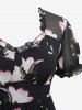 Robe mi-longue asymétrique en mousseline de soie à volants et imprimé floral grande taille - Noir 2X | US 18-20