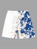 Tenue de plage hawaïenne assortie grande taille à imprimé feuilles tropicales et fleurs colorblock pour couples - Bleu 