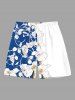 Tenue de plage hawaïenne assortie grande taille à imprimé feuilles tropicales et fleurs colorblock pour couples - Bleu 