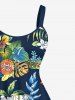 Tenue de plage hawaïenne assortie grande taille à imprimé feuilles tropicales et fleurs d'hibiscus pour couples - Noir 