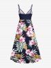 Tenue de plage hawaïenne assortie grande taille à imprimé feuilles tropicales et fleurs d'hibiscus pour couples - Bleu profond 