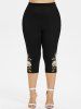 Leggings Capri grande taille à imprimé fleurs, feuilles et branches - Noir M