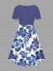 Robe hawaïenne cintrée grande taille à imprimé feuilles tropicales et fleurs d'hibiscus - Bleu 4X
