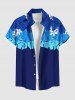 Tenue de plage hawaïenne assortie grande taille à imprimé feuilles tropicales et fleurs d'hibiscus pour couples - Bleu 