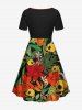 Robe trapèze cintrée grande taille à imprimé feuilles tropicales, fleurs et crânes, style hawaïen - Noir M
