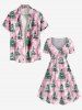 Robe grande taille à imprimé flocons de neige et boules de Noël, nœud papillon et ceinture. - Rose clair M