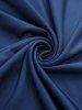 Ensemble grande taille composé d'un haut asymétrique à épaules dénudées, lacé et orné de sequins scintillants, et d'un pantalon large à volants. - Bleu profond 