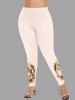 Leggings grande taille à imprimé miroir magique avec Père Noël et houx, motif nœud papillon et Père Noël. - Rose clair XS