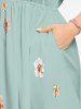 Robe mi-longue hawaïenne fendue à imprimé floral et feuilles grande taille - Turquoise XS