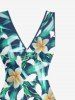 Robe hawaïenne à imprimé floral tropical et feuilles, à volants et fente cache-cœur - Bleu profond S