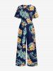 Combinaison hawaïenne à imprimé floral tropical et feuilles, col en V et jambes larges - Bleu profond XS