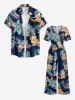 Combinaison hawaïenne à imprimé floral tropical et feuilles, col en V et jambes larges - Bleu profond XS