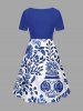 Robe hawaïenne grande taille en porcelaine bleue et blanche à motif de vase, fleurs et feuilles, cintrée - Bleu 6X