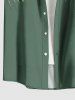 Chemise hawaïenne grande taille pour homme, imprimée de fleurs d'hibiscus et de feuilles tropicales, avec boutons et poche. - Vert S