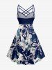 Robe hawaïenne grande taille à imprimé floral et feuilles, froncée et bretelles croisées. - Bleu profond 1X