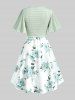 Robe style cottagecore grande taille avec haut court plongeant torsadé et bretelles spaghetti à imprimé floral 3D - Vert 1X | US 14-16