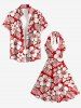 Robe trapèze hawaïenne à imprimé feuilles tropicales et fleurs d'hibiscus, décolleté plongeant et lien nuque - Rouge S