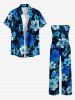 Combinaison Hawaï à imprimé fleurs d'hibiscus et feuilles tropicales avec poche V, ceinture et bretelles amovibles - Bleu profond 1X