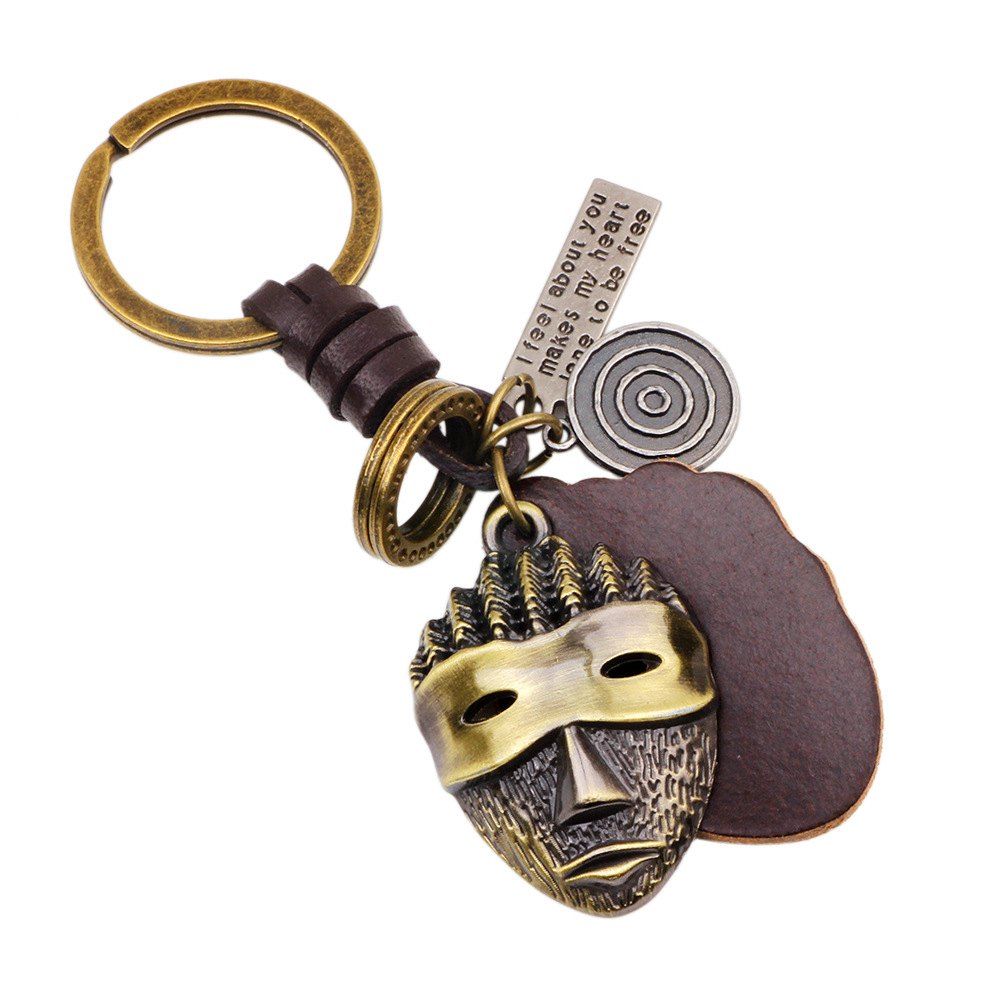 

Hot Sale Punk Alloy Mask Pendant Keychain with Leather Piece, Bronzed