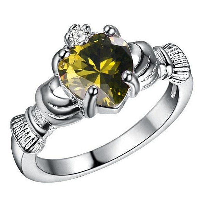 

Holding Heart Shaped Color Gemstone Crystal Ring, Venom green