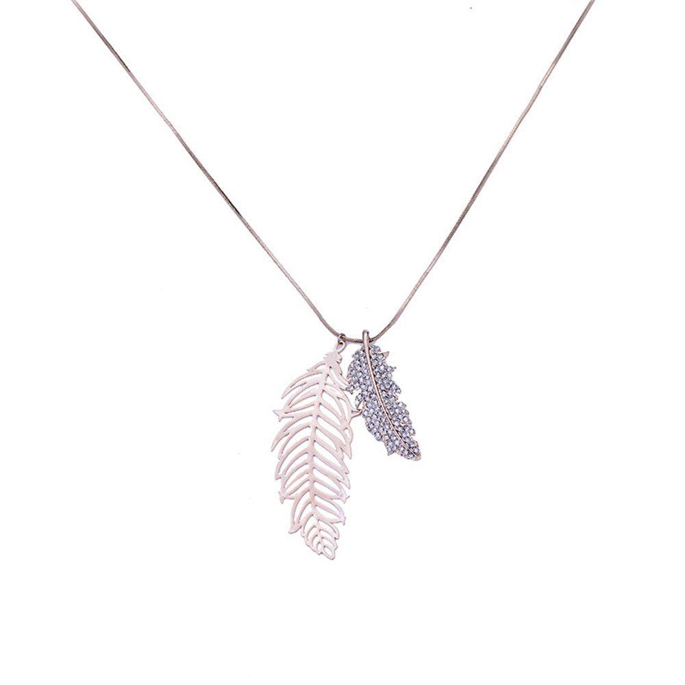

A Long Necklace of Metal Leaves, Gold